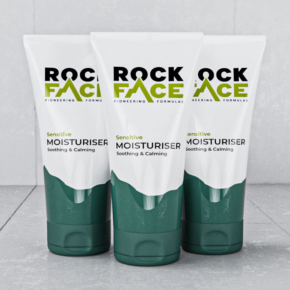 Alternative text (alt text): Three tubes of Rock Face sensitive moisturiser standing side by side on a neutral surface.