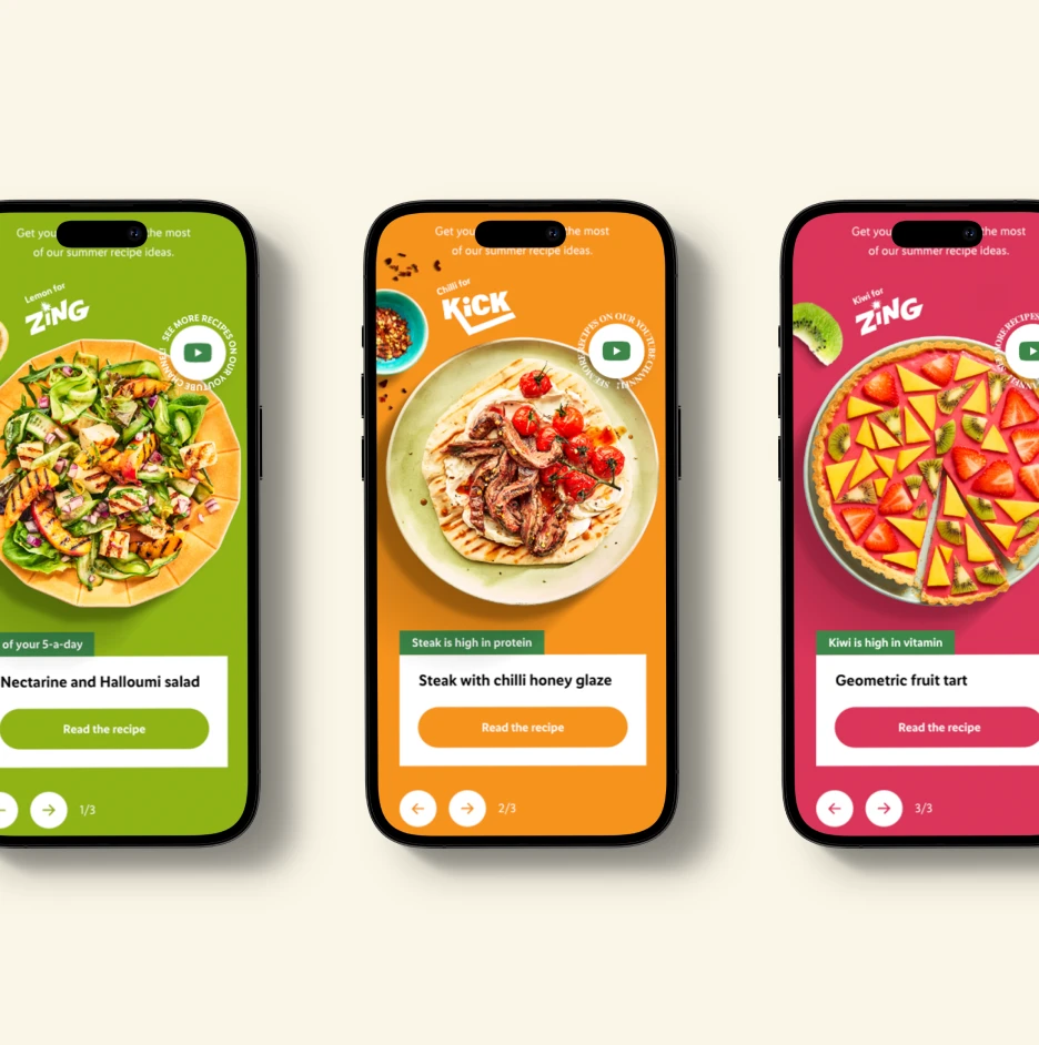Three smartphone screens displaying colorful recipe cards for salads, steak dishes, and fruit desserts in a food app interface.