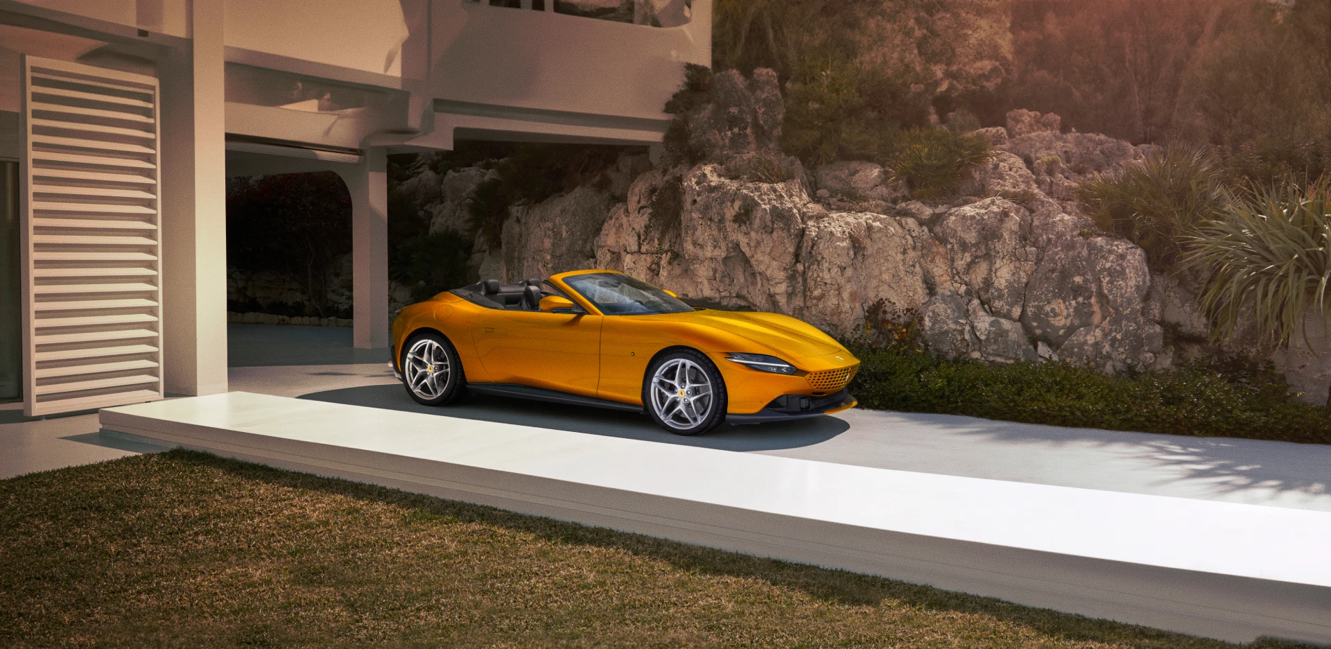 Luxury convertible sports car photographed outside a modern house with professional photo retouching and colour grading